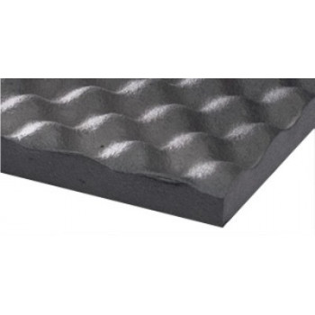 A dark gray foam panel with a wavy, textured surface sits alone against a white background and appears to have been cut at an angle.