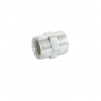 A metallic pipe connector with internal threading lays on a plain white background, indicating an industrial mechanical component likely used in plumbing or machinery.