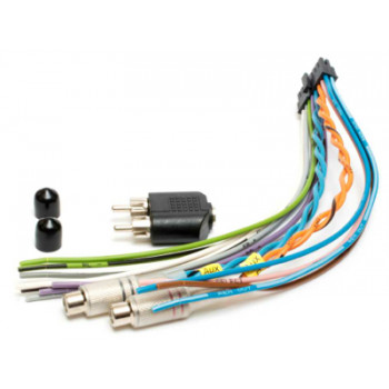 A bundle of multicolored wires and audio connectors lies on a white surface, alongside a black audio adapter and two small black caps.