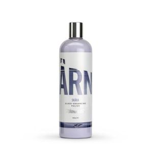A cylindrical bottle labeled with "ÄRN Skära Gloss-Enhancing Polish" stands upright on a white background. The bottle has a silver cap and contains 500 ml of product.