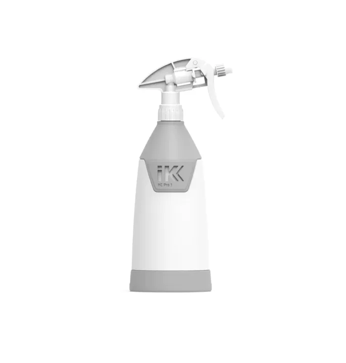Spray bottle, standing upright, features a gray trigger nozzle and base with "IK HC Pro 1" label, set against a plain white background.