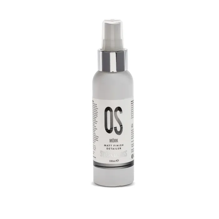 White spray bottle labeled "OS MÖRK Matt Finish Detailer STJARNAGLOSS 100ml" with a gray press nozzle and silver collar, standing against a white background.