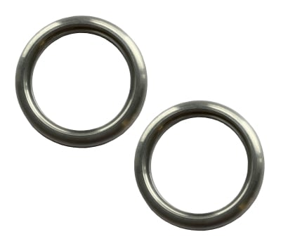 Two metallic rings lie side by side, slightly overlapping, on a plain white background, showing a polished and smooth surface.