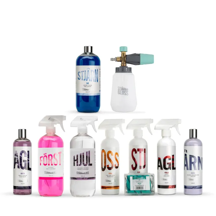 Bottles of various car cleaning products arranged in two rows against a white background. Top row includes a foam cannon and a blue liquid; bottom row features eight spray and liquid bottles in different colors labeled "AGL," "FÖRST," "HJUL," "OSS," "STJ," "AGL," and "STJÄRN."