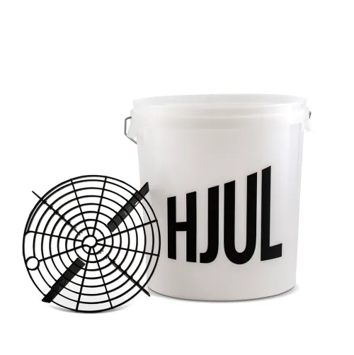 White plastic bucket labeled "HJUL" and a separate black circular grid design, set against a plain white background.