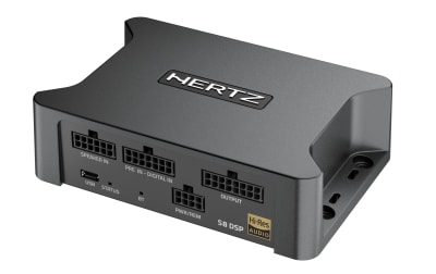 A black Hertz audio device labeled "Hertz H8 DSP Hi-Res Audio" features several ports for input and output connections, sitting on a gray surface.