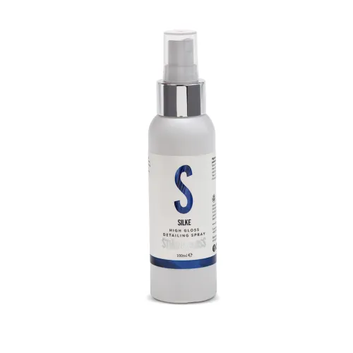 A white bottle labeled "SILKE HIGH GLOSS DETAILING SPRAY," features a large blue "S" and contains 100 ml of product. It has a spray nozzle and a transparent cap.