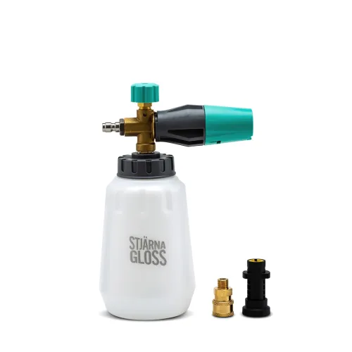 White foam cannon with green and black spray nozzle, labeled "Stjärna Gloss," pictured with a brass adapter and black plastic connector against a white background.