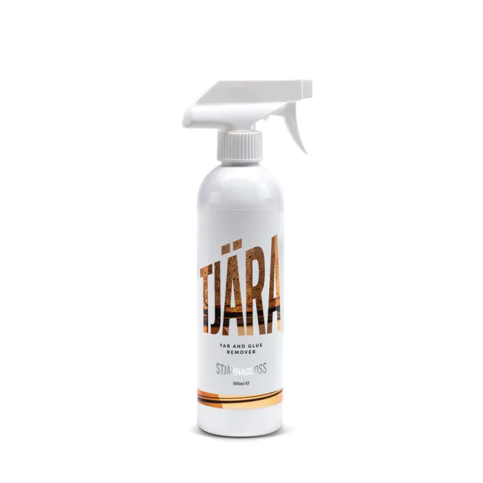 A white spray bottle labeled "TJÄRA" with "TAR AND GLUE REMOVER" and "STJÄRNAGLOSS" contains 500ml of cleaning product, displayed against a plain white background.