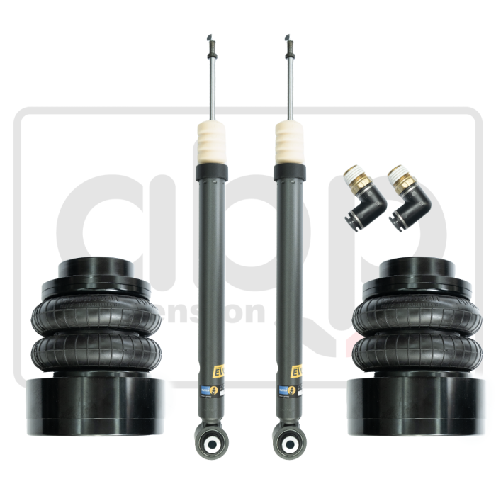 Two black suspension struts stand vertically between two black air springs and two silver valve connectors against a plain white background. The logo "CliQ Suspension" is faintly visible behind them.