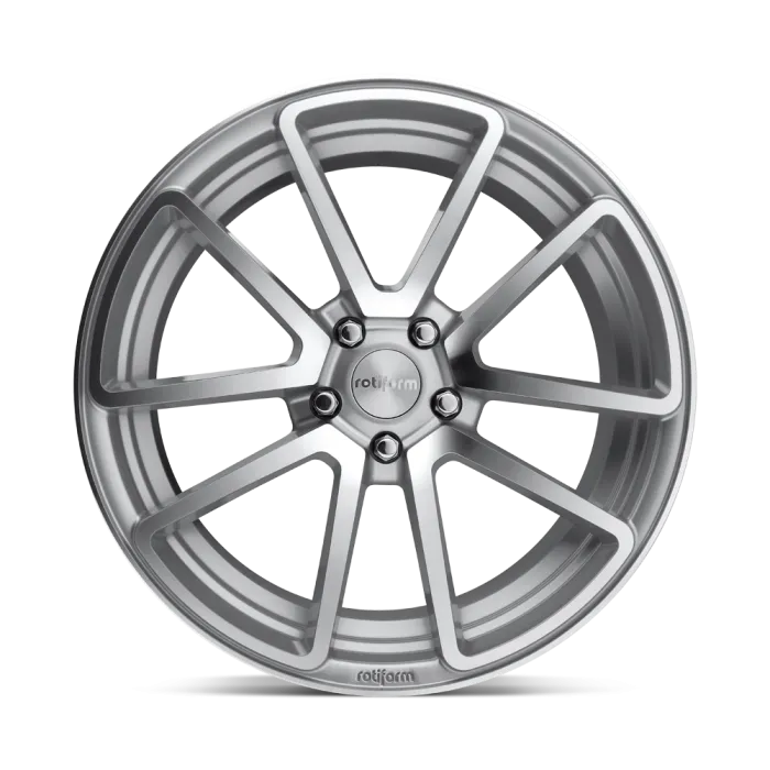 A silver alloy car wheel with a multi-spoke design, displaying the text "rotiform" at its center and bottom, against a plain white background.