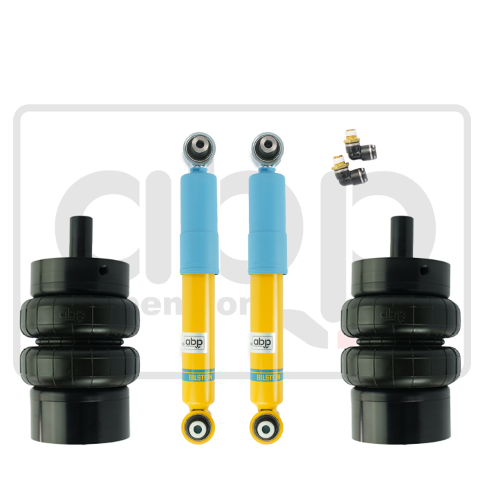Two yellow and blue shock absorbers are flanked by large black air springs and small black valve fittings, displayed against a white background with an ABP logo in grey.