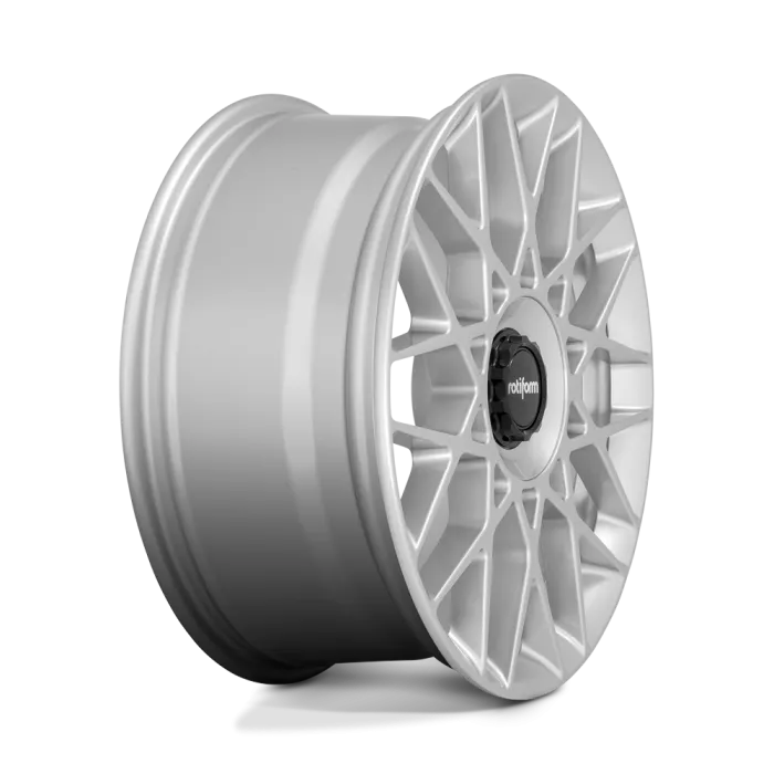 A silver alloy wheel with intricate lattice spokes and a center cap reading "Rotiform", positioned against a plain white background.