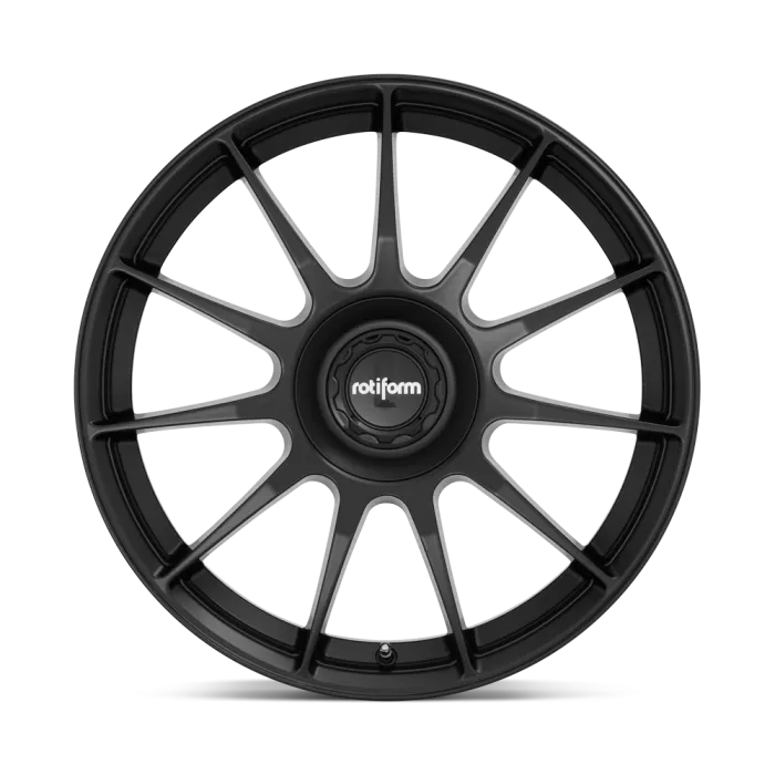 A matte black alloy car wheel with a central hub logo reading "rotiform", featuring a multi-spoke design, against a plain grey background.