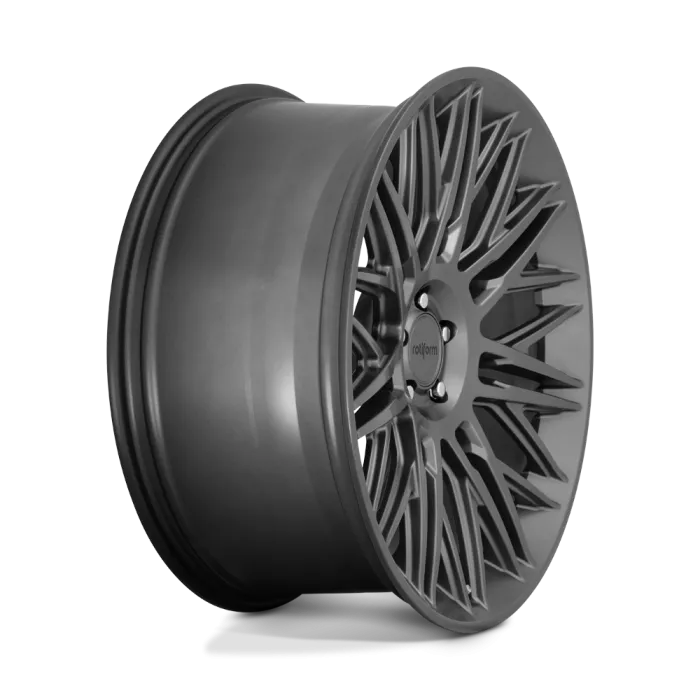 A matte black car wheel with intricate, angular spokes is positioned upright against a plain, light background. The central hub displays the brand name "rotiform."
