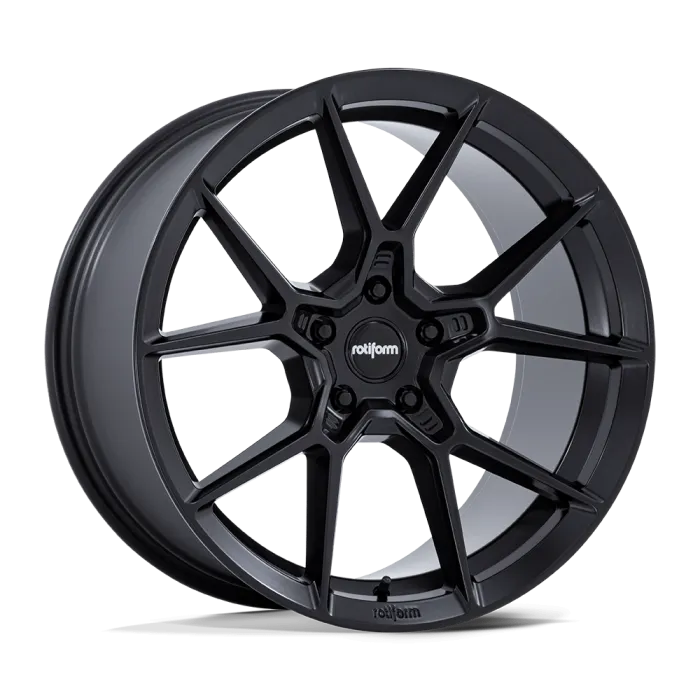A black, multi-spoke alloy car wheel with "rotiform" branding, standing upright on a plain white background with a slight shadow beneath.