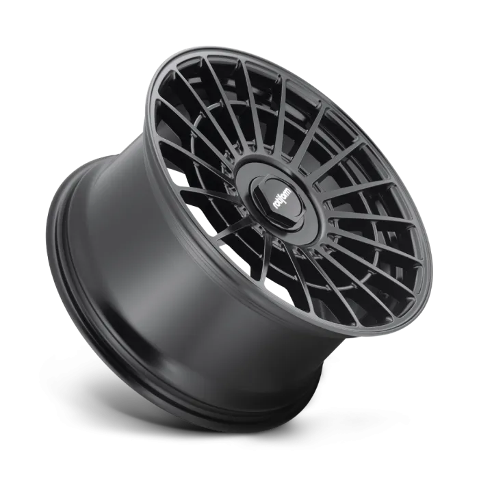 A black, multi-spoke car wheel rim with a central hub featuring the word "rotiform" displayed against a plain gray background.