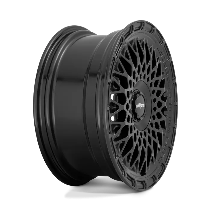 A black alloy wheel with intricate, mesh-style spokes; the brand name "rotiform" is printed on the center cap. The wheel is displayed against a plain white background.