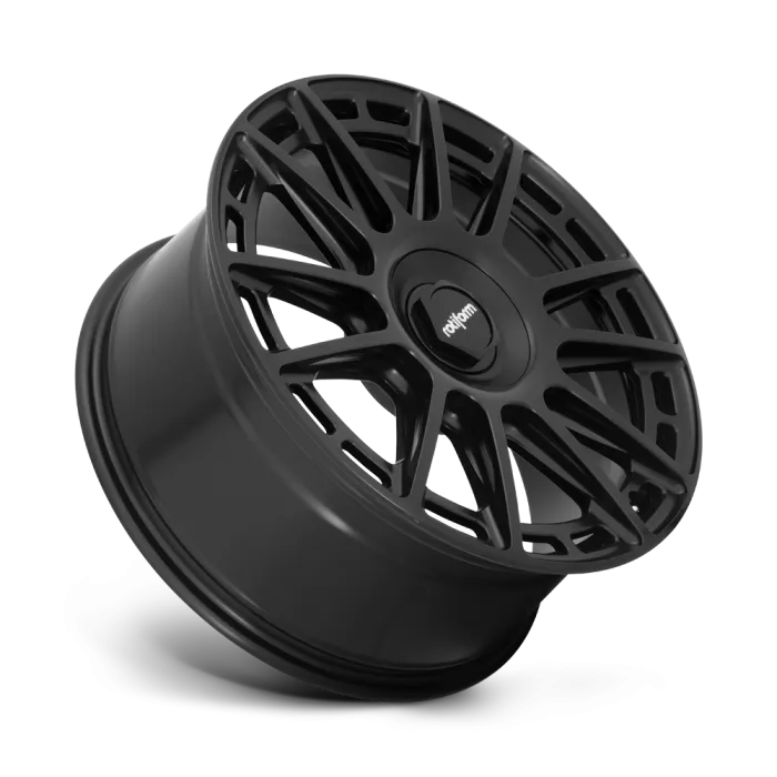 A matte black, multi-spoke alloy wheel with the text "rotiform" on the center cap, shown against a plain background.