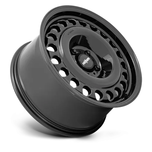 A shiny black alloy wheel with multiple circular holes around the edge and the word "rotiform" written on the center cap, displayed against a plain gray background.