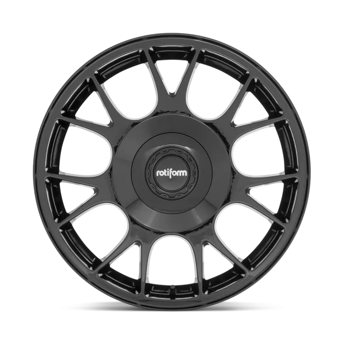 Black alloy wheel with a multi-spoke design and "rotiform" logo in the center cap, viewed against a plain background.