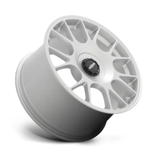 Silver alloy car wheel with a multi-spoke design, featuring a black center cap labeled “rotiform”; displayed against a white background. The wheel is positioned at an angle.