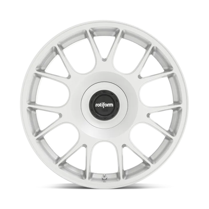 A white, multi-spoke alloy wheel with the center cap displaying "rotiform" in black and white; set against a plain white background.