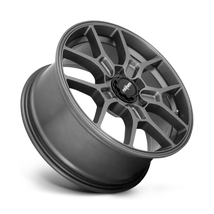 A dark grey alloy wheel with a five double-spoke design, displaying the brand name "Rotiform" on its center cap, is angled against a plain background.