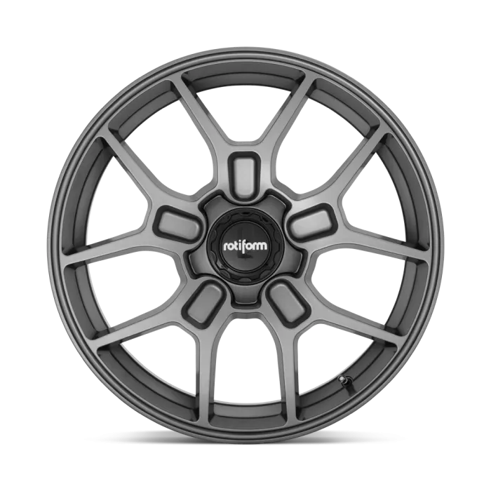 A matte black alloy wheel with a multi-spoke design, displaying the text "rotiform" in the center against a white background.
