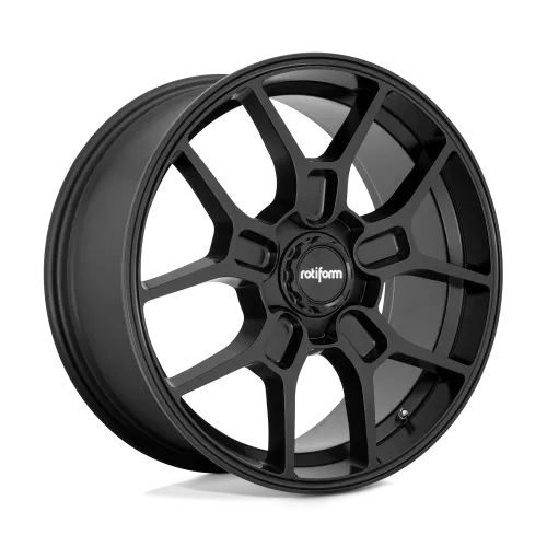 A black, multi-spoke car wheel rim, showing a sleek design with the brand name "rotiform" at the center, displayed against a plain white and black background.