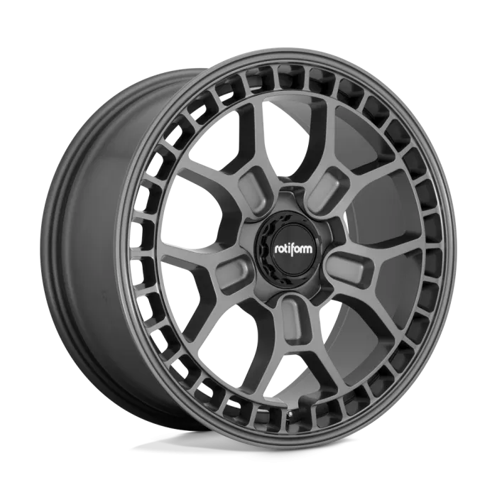 A black, multi-spoke alloy wheel with intricate design, featuring the logo "rotiform" at its center, viewed against a plain background.