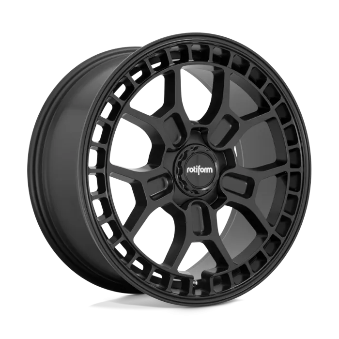 A black alloy wheel with a complex, multi-spoke design, featuring the brand name "rotiform" in white on the center cap, displayed against a white background.