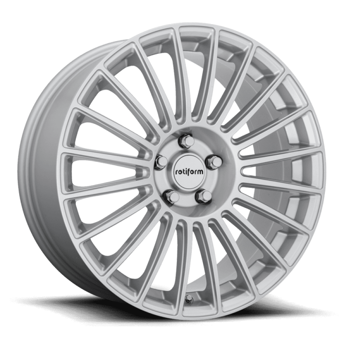 A silver alloy wheel with a multi-spoke design rests against a plain backdrop. The central hub features the text "rotiform" and is secured with five bolts.