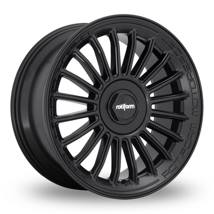 Black alloy wheel with multiple slim spokes, centered around the Rotiform logo. Surrounding text reads, "ROTIFORM MOTORSPORT." The wheel is displayed over a plain white backdrop.