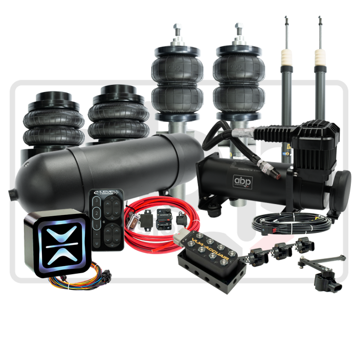 Air suspension kit components including air springs, compressors, tanks, wiring, and control systems, arranged on a white background. Notable text: “e-Level” on the controller and “abp” on one compressor.