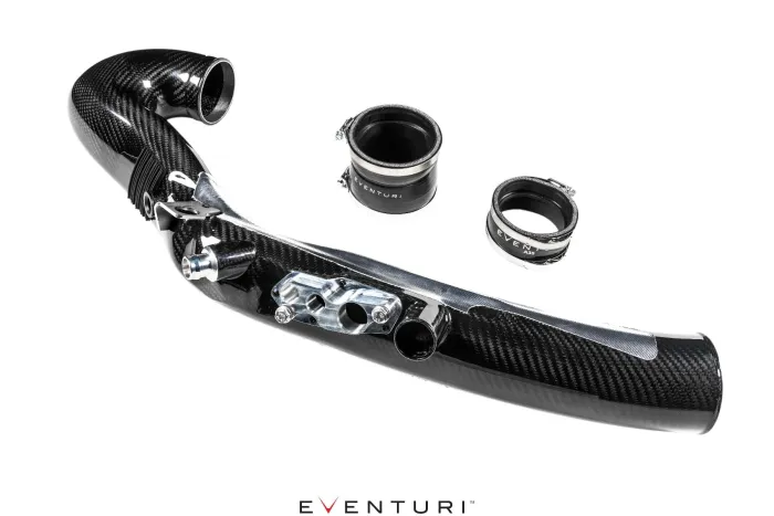 Carbon fiber intake tube with attached components, three cylindrical connectors labeled "EVENTURI" resting alongside, on a white background. Text reads: EVENTURI.
