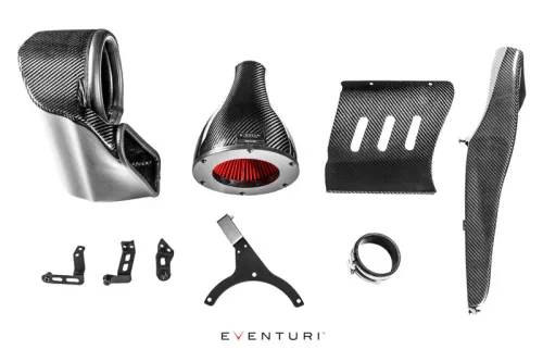 A collection of Eventuri carbon fiber automotive parts, including air intake components, mounts, and brackets, arranged on a white background.