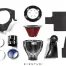 Various car engine parts arranged on a white background, including a red air filter, carbon fiber intake components, metal brackets, clamps, and a blue-tinted cover. Text: "EVENTURI".