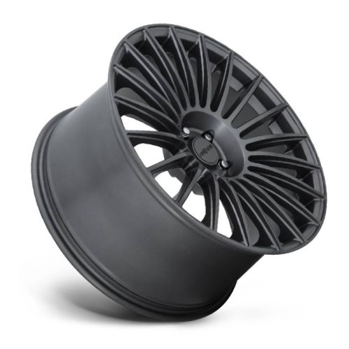 A black, multi-spoke car wheel rim, angled slightly and resting on a white background with the brand name "Shiftline" visible in the center hub.