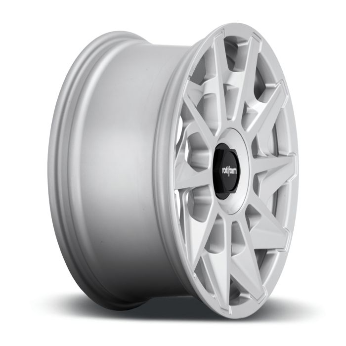 A silver alloy wheel with a multi-spoke design and the brand "rotiform" on a black center cap, resting on a white surface.