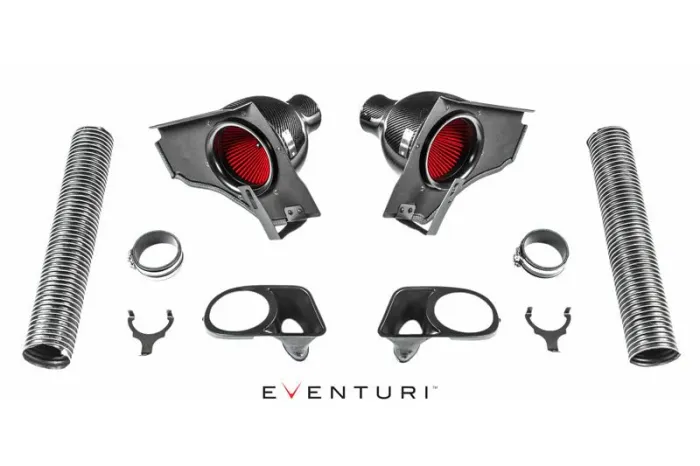 An assortment of car air intake components, including carbon fiber intake ducts with red filters, flexible hoses, and various mounting brackets, arranged symmetrically on a white background. Text: "EVENTURI."