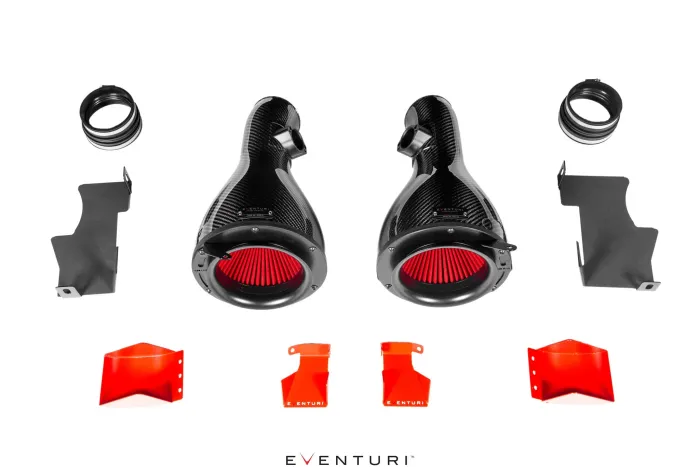 Two black carbon fiber air intake systems with red filters are flanked by hardware components and branded red shields on a white background. Text: "EVENTURI."