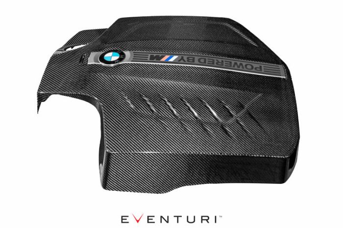 Carbon fiber engine cover, showcasing a BMW logo and "POWERED BY M" text, is set against a white background. The word "EVENTURI" is printed beneath it.