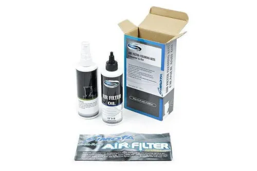Box labeled "SIMOTA Air Filter Cleaning Kits Cleaner & Oil" with open flap, displaying spray bottle, oil bottle, and product flyer on white surface. Instructions and branding visible on bottles and packaging.