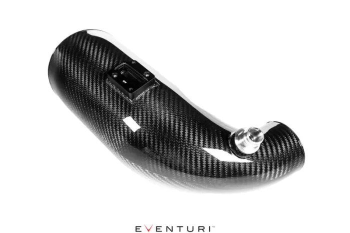 A glossy black carbon fiber car intake pipe lies diagonally on a white background. At the bottom center, "Eventuri™" is printed in black and red.