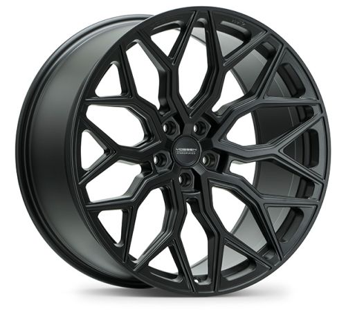 A black alloy wheel with a complex, geometric spoke design is displayed on a white background. The center cap reads "VOSSEN FORGED."