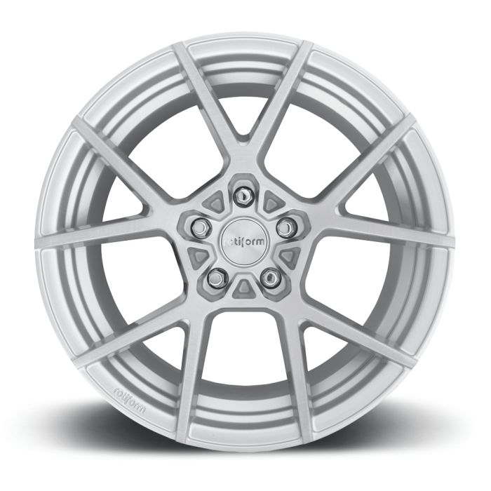 A silver alloy car wheel with a multi-spoke design and "rotiform" inscribed in the center hub. The wheel is set against a white background, showing its polished metallic finish.