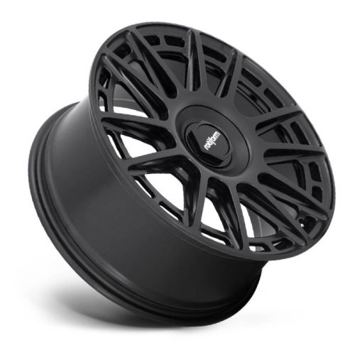 A black, multi-spoke car wheel rim rests on its side against a white background with "Rotiform" visibly inscribed in the center.