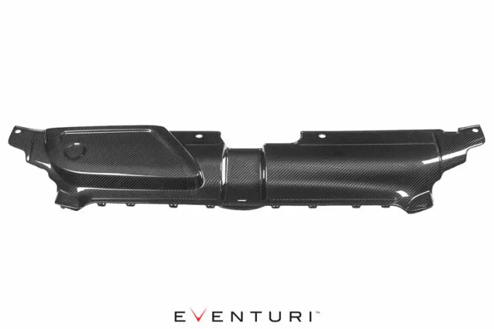 Carbon fiber car part over a white background. The part has a sleek design with holes for fittings and a textured surface. Text below reads: "EVENTURI".