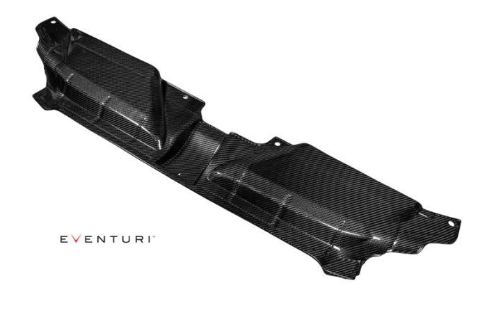 Carbon fiber engine cover resting on a white background. The text "Eventuri" is visible in the lower left corner.